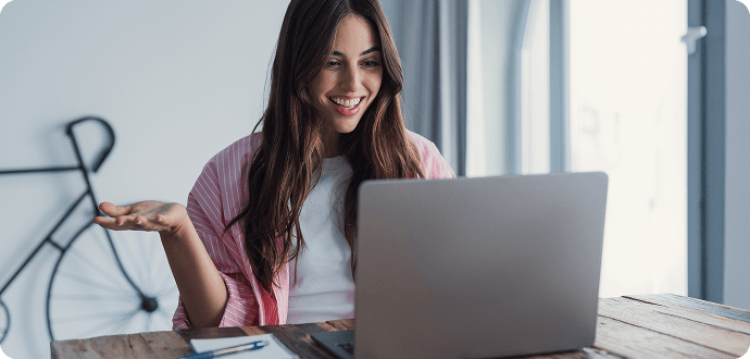 A woman looking happy with her work