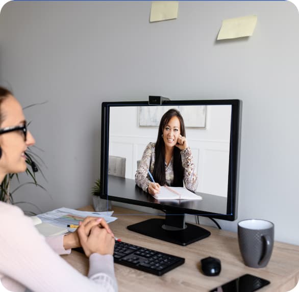 A lady watching Thais on a PC