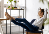 A woman sitting in a chair looking unsure.